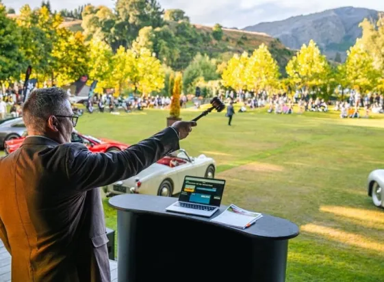 Auctioneer at a Sunday Drive live auction